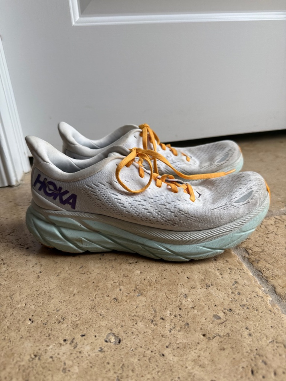 Hoka Clifton 8 White Running Sneakers with Mint Midsole and Yellow Laces